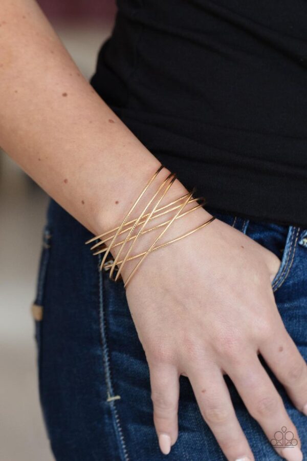 Paparazzi Bracelet ~ Strike Out Shimmer - Gold